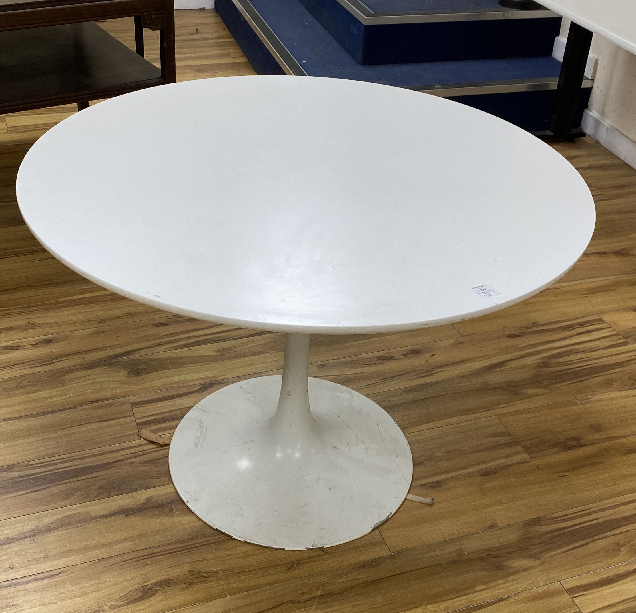 An Arkana tulip table, diameter 106cm height 72cm